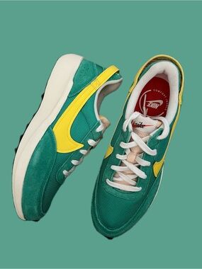 Women’s 9 Green and Yellow Athletic Nike Sneakers Never Worn